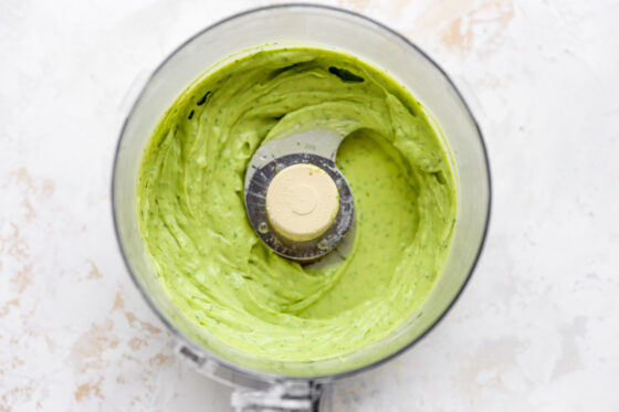 Avocado crema in a food processor.