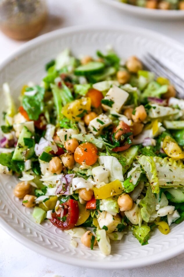 A plate containing a portion of Italian chopped salad.