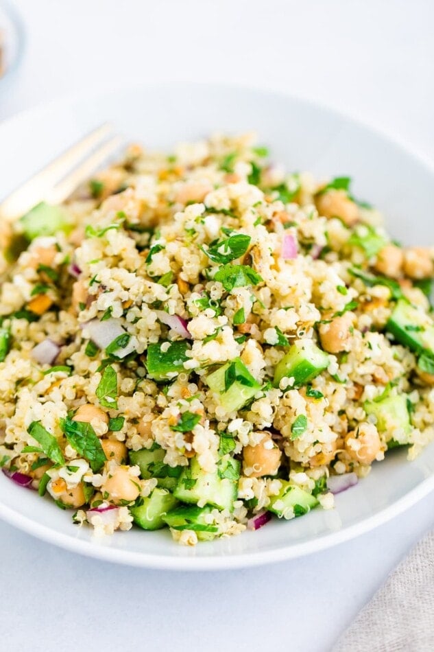 Quinoa salad on a white plate.