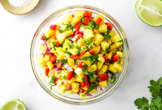 Pineapple salsa in a mixing bowl.