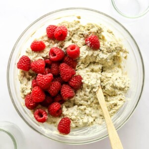 Raspberries added to the overnight oat mixture.