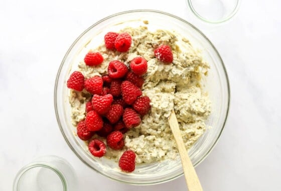 Raspberries added to the overnight oat mixture.