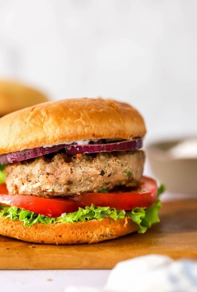 https://www.eatingbirdfood.com/wp-content/uploads/2022/04/turkey-burger-to-the-side-642x950.jpg