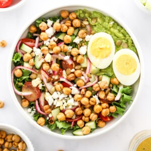 Overhead view of a mashed avocado bowl.