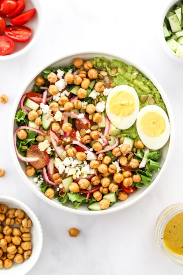 Overhead view of a mashed avocado bowl.