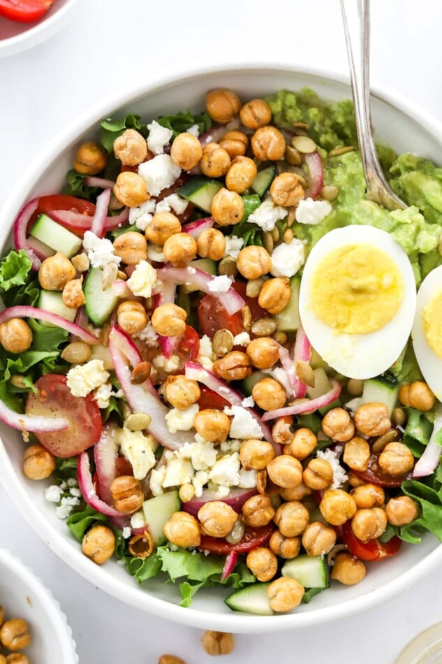 Close up overhead photo of a mashed avocado bowl.