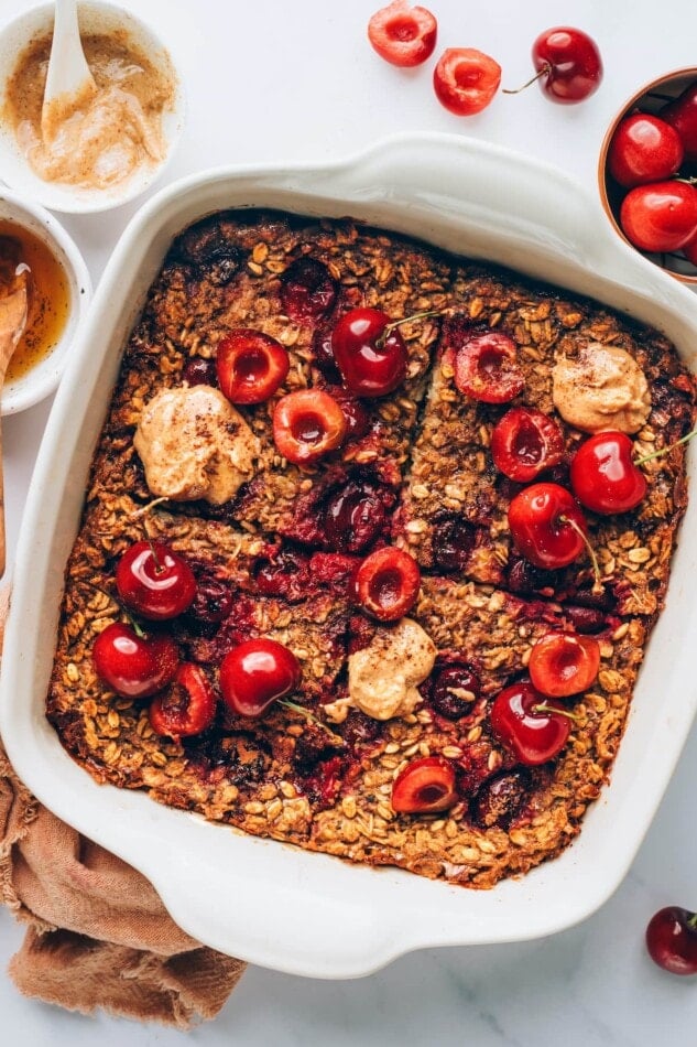 Overhead photo of cherry baked oatmeal in a baking dish.