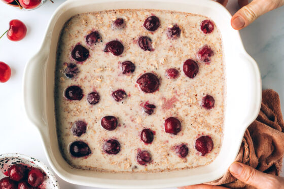 Cherries added to the baking dish.