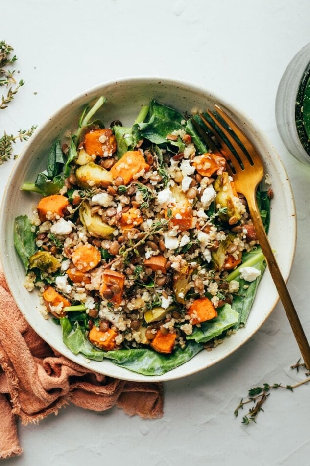 Sweet potato lentil mason jar salad served in a bowl.