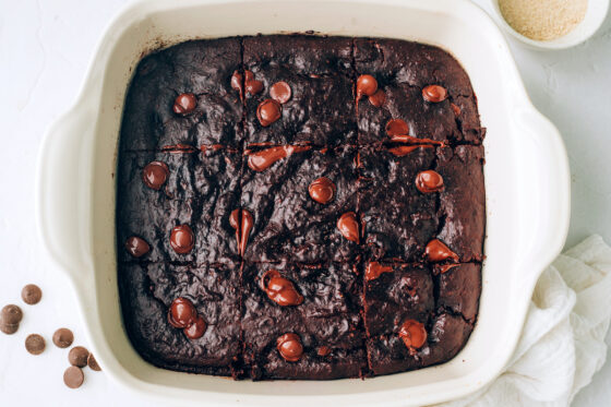 Baked brownies in an 8x8 pan cut into 9 bars.