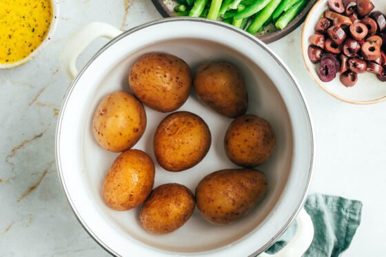 Potatoes cooking in water.