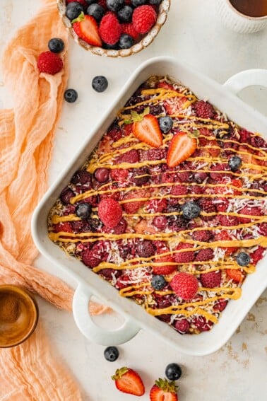 Overhead view of a square baking dish containing baked oatmeal.