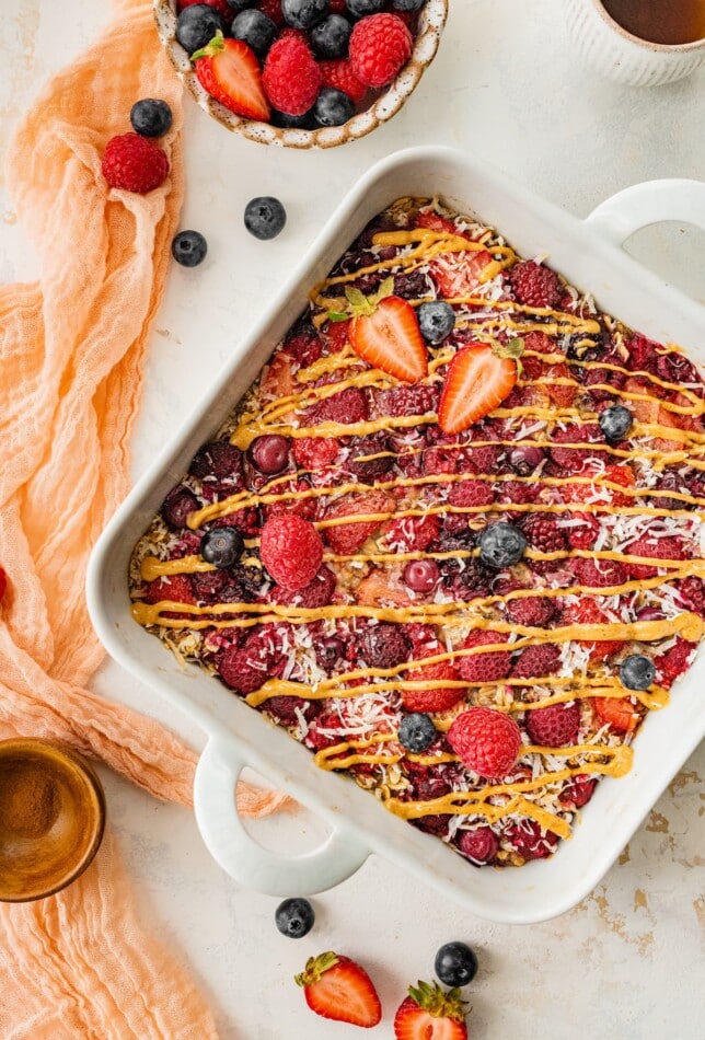 Overhead view of a square baking dish containing baked oatmeal.