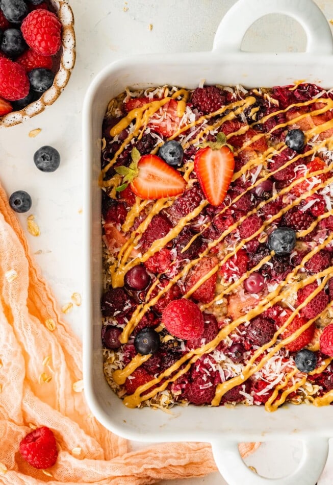 A baking dish containing baked oatmeal. The dish is cropped to the right of the image.