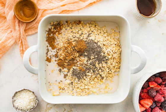 One pan baked oatmeal ingredients in a square baking dish.