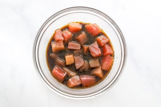 Marinating tuna in a bowl.