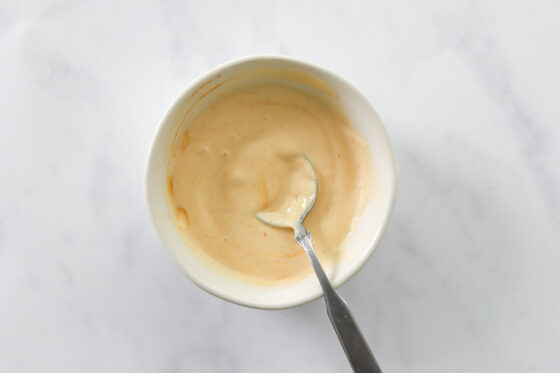 Sriracha mayo mixed together in a bowl.