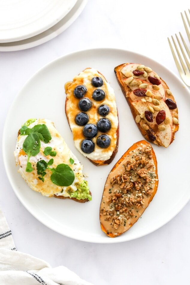 Four varieties of sweet potato toast on a plate.