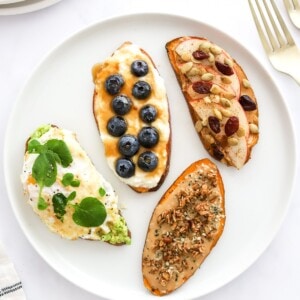 Four varieties of sweet potato toast on a plate.