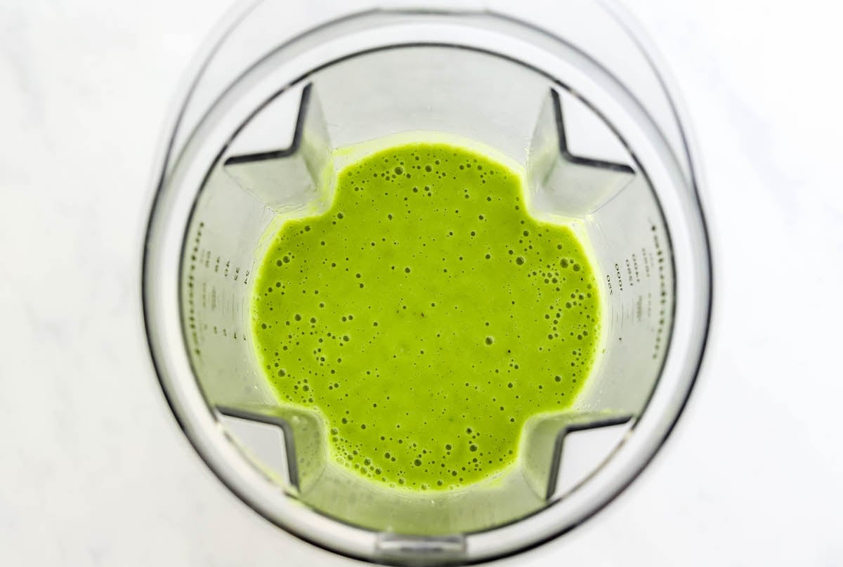 Vitamin C smoothie ingredients blended together in a blender.