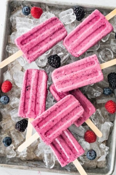 cropped-greek-yogurt-popsicles-overhead-over-ice-with-berries.jpg
