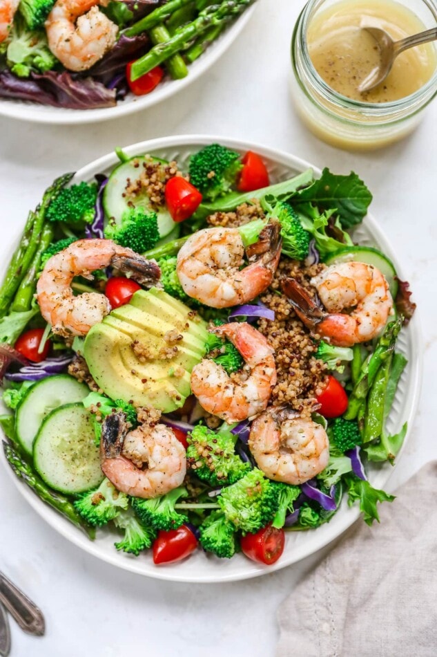 Overhead photo of a bowl of grilled shrimp salad.