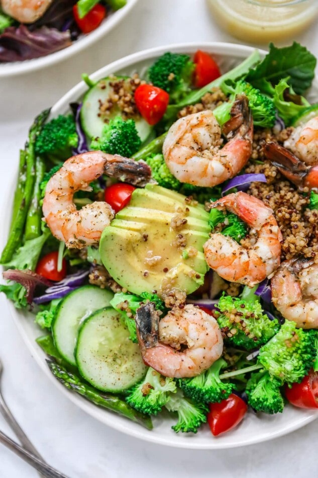 Overhead bowl of grilled shrimp salad.