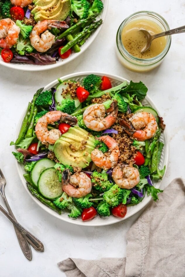 Overhead photo of a bowl of grilled shrimp salad.
