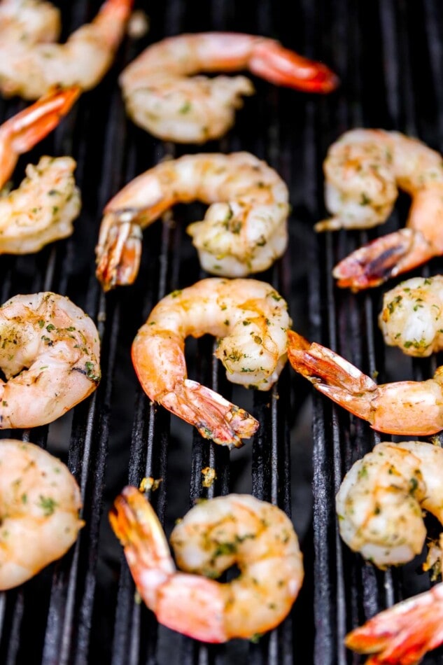 Shrimp being cooked on a grill.