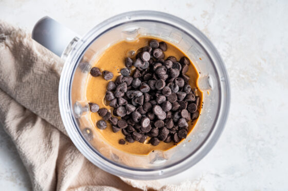 Chocolate chips added to a high powered blender.