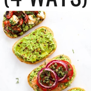 Four styles of avocado toast laid diagonally across the photo frame.
