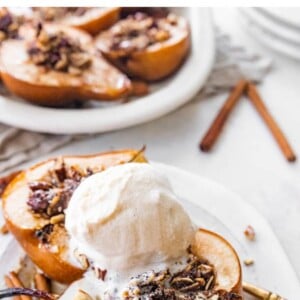Baked pears served with ice cream.