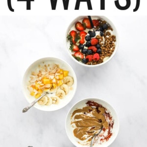 Four bowls of yogurt with different toppings.