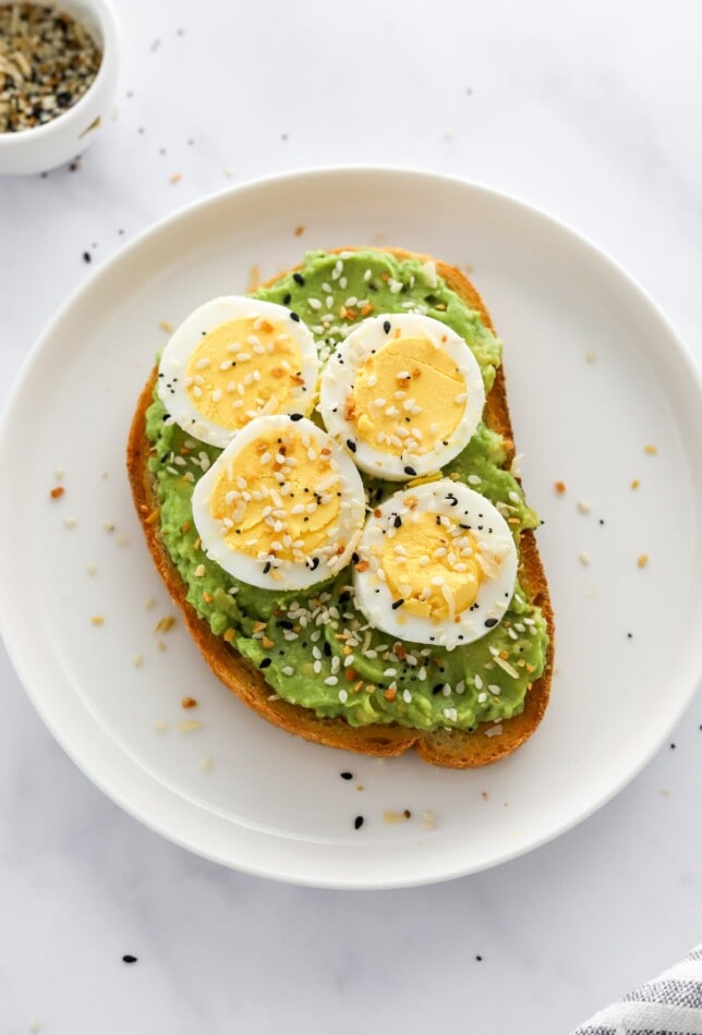 Everything Bagel Seasoning and Egg Avocado Toast served on a plate.