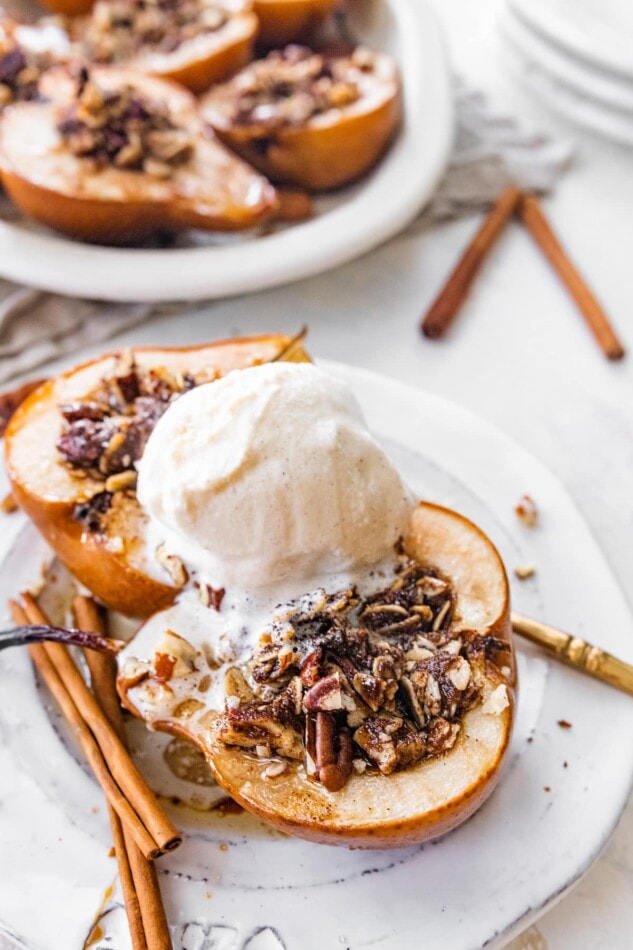 Baked pears served with ice cream.