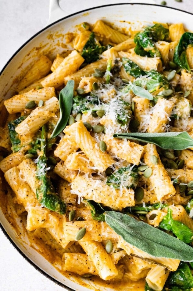 Creamy pumpkin pasta in a pot.