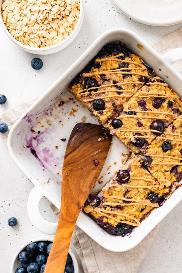 A pan of protein baked oatmeal with two servings missing.