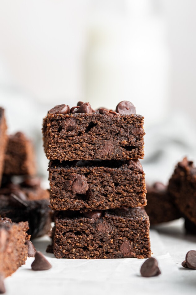 Three pumpkin brownies stacked on top of each other.