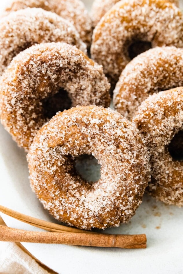 Close up of pumpkin spice donuts in a serving dish.