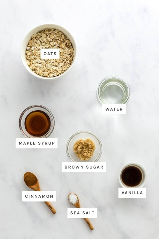 Ingredients measured out to make Maple Brown Sugar Oatmeal: oats, water, maple syrup, brown sugar, vanilla, cinnamon and sea salt.