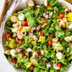 Antipasto salad in a large serving bowl.