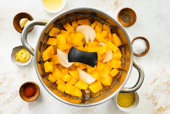 Steaming chunks of butternut squash.