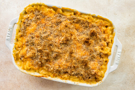 Healthy baked mac and cheese in a rectangular baking dish.