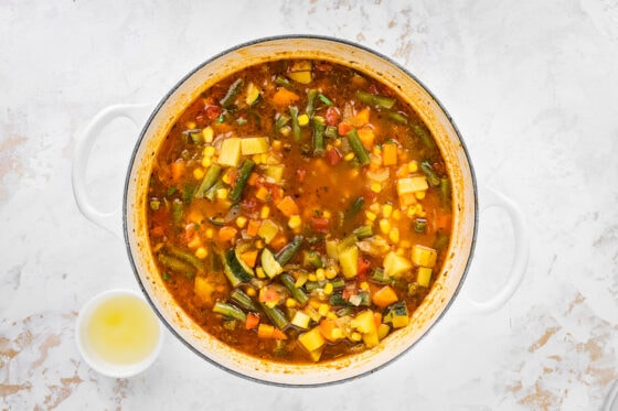 Vegetable soup cooking in a pot.