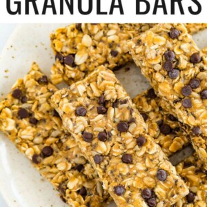 Nut free granola bars on a plate studded with chocolate chips and chia seeds.