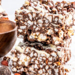 Crispy chocolate rice cake bars stacked on top of each other.