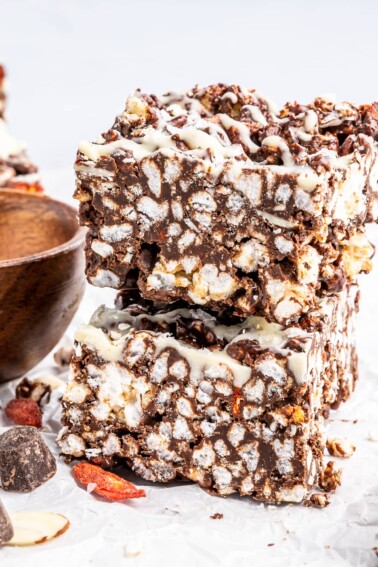 Crispy chocolate rice cake bars stacked on top of each other.