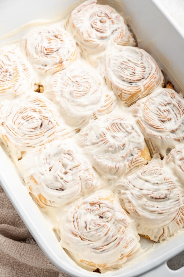 Cream cheese frosted gluten-free cinnamon rolls.