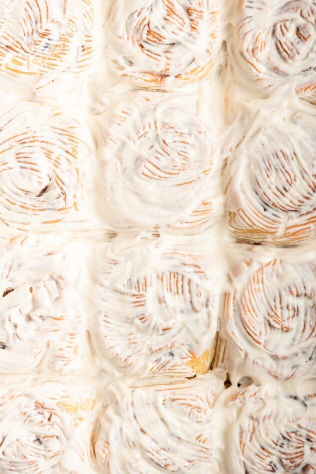Cream cheese frosted gluten-free cinnamon rolls.