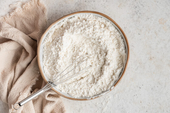 Dry ingredients whisked together in a bowl.